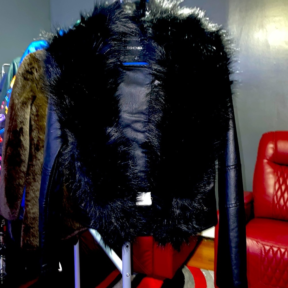 Black biker jacket with fur on neck brand new, never worn